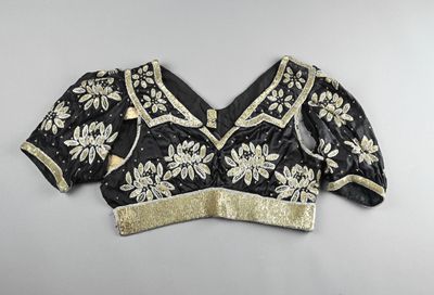 TUNISIE, XXe siècle Corsage noir, argenté et doré, à encolur…