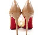 pair of women ' s high heel shoes on a white background