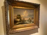 a picture of a painting hanging on the wall in a room