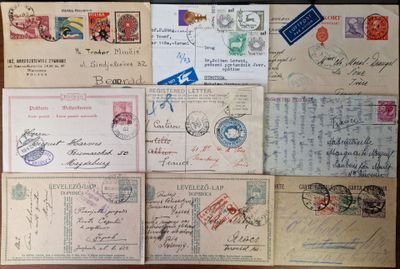many different types of letters and envelopes laid out on a table