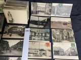 several old black and white photographs of old buildings and cars