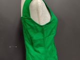 the back of a green top on a mannequin mannequin mannequin mannequin mann
