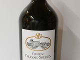 a bottle of wine that is sitting on a table