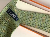 a tie that is laying on top of a book
