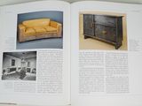 a book with pictures of a living room and a couch