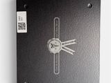 an image of a black book with a clock on it