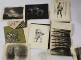 a lot of drawings on a white table top