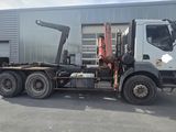 a large truck that is parked in front of a building