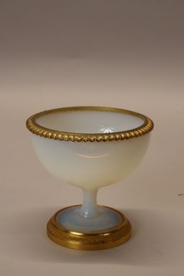 an image of a white and gold bowl with a gold rim
