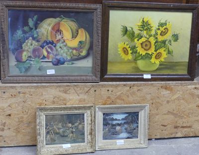 three framed pictures of sunflowers and fruit on display
