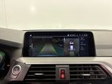 the dashboard of a car with a gps device in the center