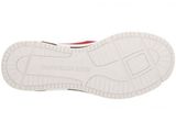 the sole of a pair of red and white shoes on a white surface