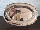 a person taking a picture of themselves in a mirror