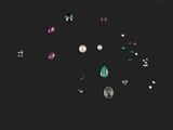 une image représentant un assortiment de pierres précieuses de différentes couleurs sur fond noir