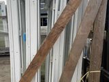 several pieces of wood are stacked on top of a pallet