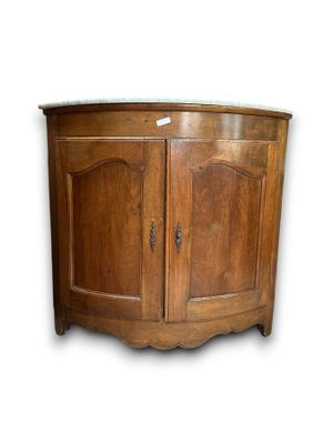 a wooden cabinet with a door and a drawer underneath it