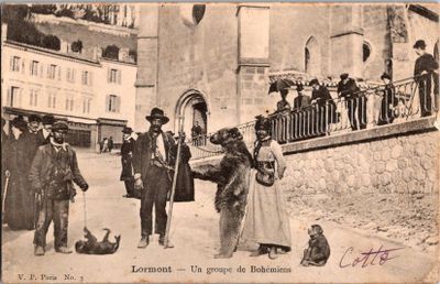 an old photo of a group of people on the street