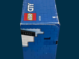 a blue box with a lego figure inside of it