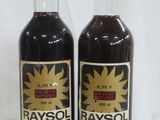 Deux bouteilles de Raysol sont posées côte à côte sur une table.