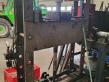 an image of a machine that is sitting in a garage