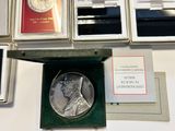 a silver coin sitting in a box on a table