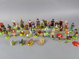 a lot of figurines that are on the table