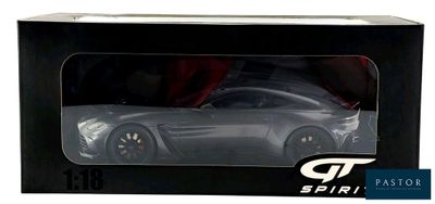 the box is open to show the model of a sports car