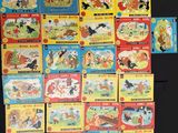 a lot of children ' s books on the table