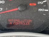 a close up of a speedometer on the dashboard of a car