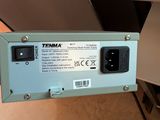 a close up of a power supply unit on a table