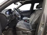the interior of a car with a steering wheel and a dashboard