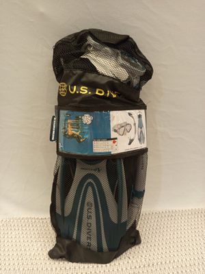 a mesh bag filled with various items on a white surface