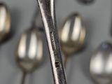 a lot of spoons that are on the table