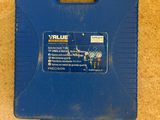 a blue tool box sitting on the floor next to a pair of shoes