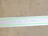 a picture of a ruler on a wooden floor
