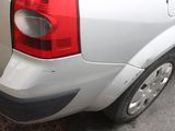 a white van parked on the side of the road