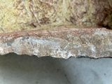 a close up of a piece of bread on a table