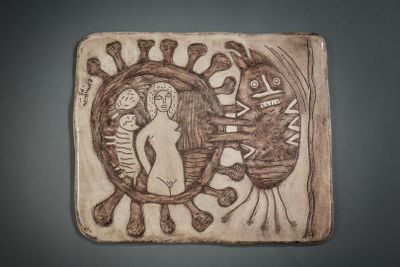a picture of a tile with a woman and a fish on it