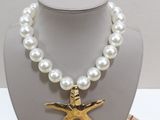 pearl necklace with gold starfish charm