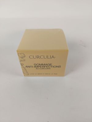 a box of cream on a white surface with a white background