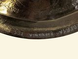 a close up of a metal object on a table