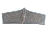 an image of a decorative piece of metal on a white background