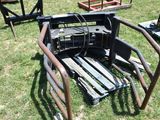 a chair that is sitting in the grass next to other chairs