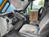 a yellow van with a box in the back of it