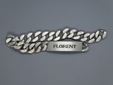 une photo d'un bracelet en argent sur lequel est inscrit le mot « florent »