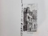 an old drawing of a building with a clock on the front of it