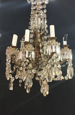 an image of a chandelier hanging from the ceiling in a room