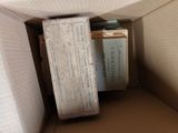 a box that has a bunch of papers inside of it