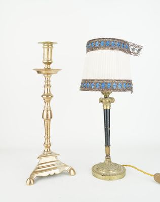 trois types de lampes différents et un abat-jour sur fond blanc
