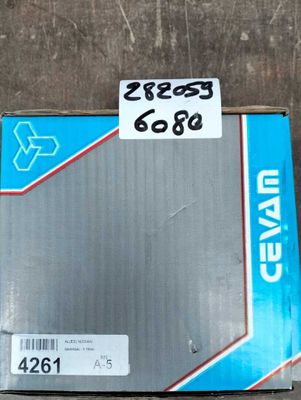 a box that is sitting on the ground with a tag on it